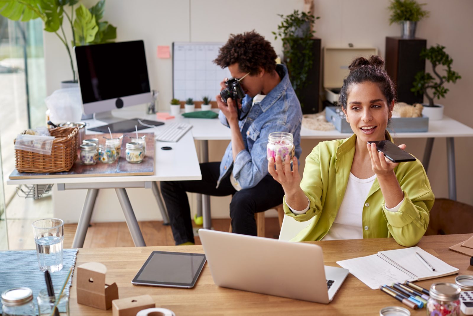 Small business owners taking original product photos for their Google Business Profile instead of using stock images