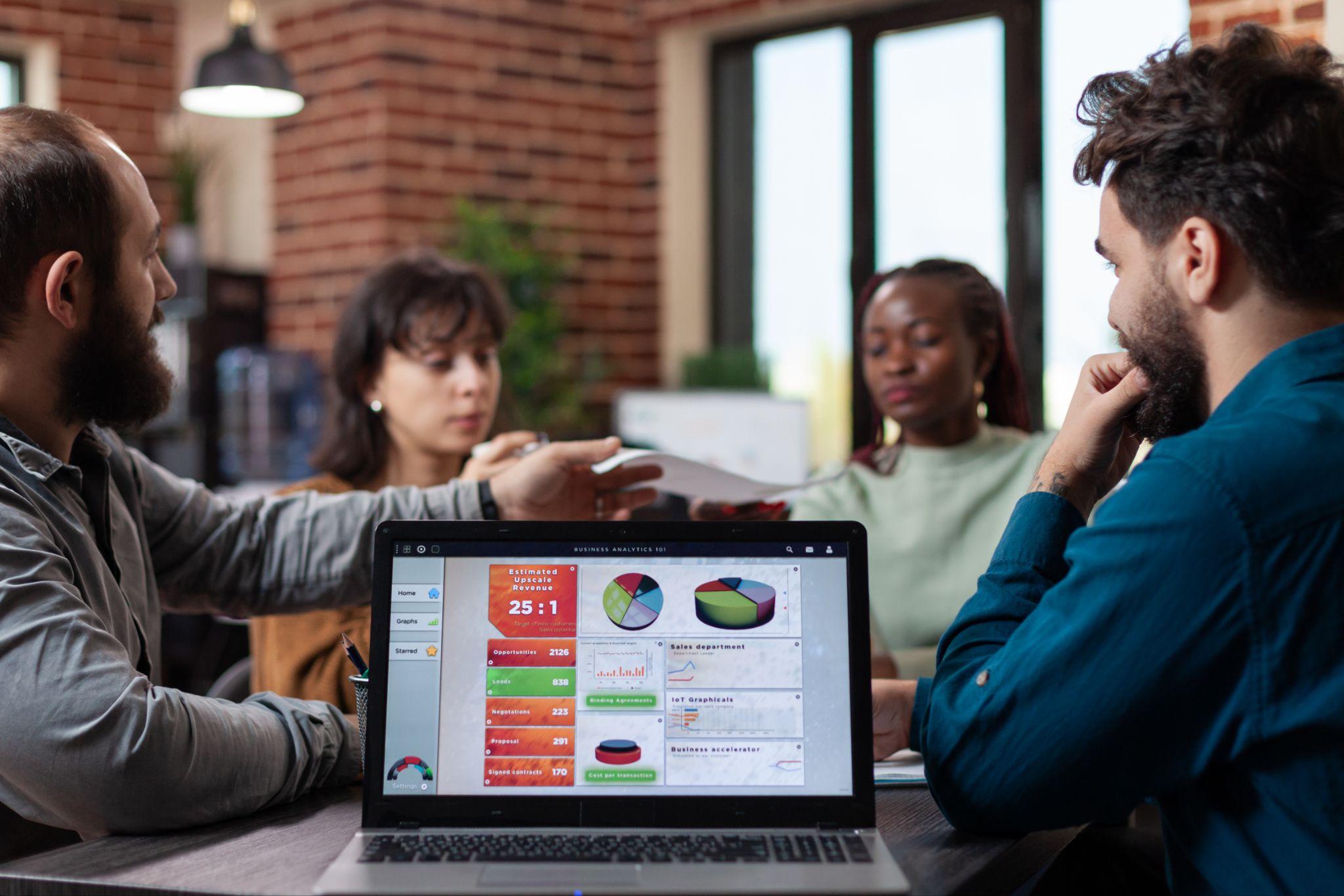 Marketing team reviewing local SEO strategy and Google Business Profile analytics