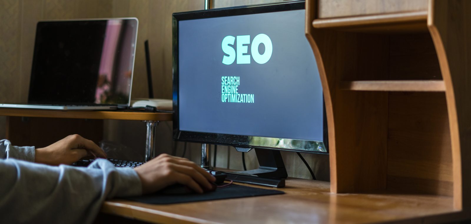 Technical SEO partner optimizing a client website from a home office desk